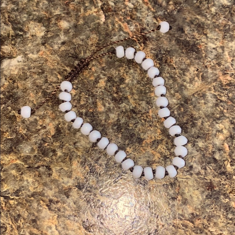 Adjustable bracelet. Check out closet!